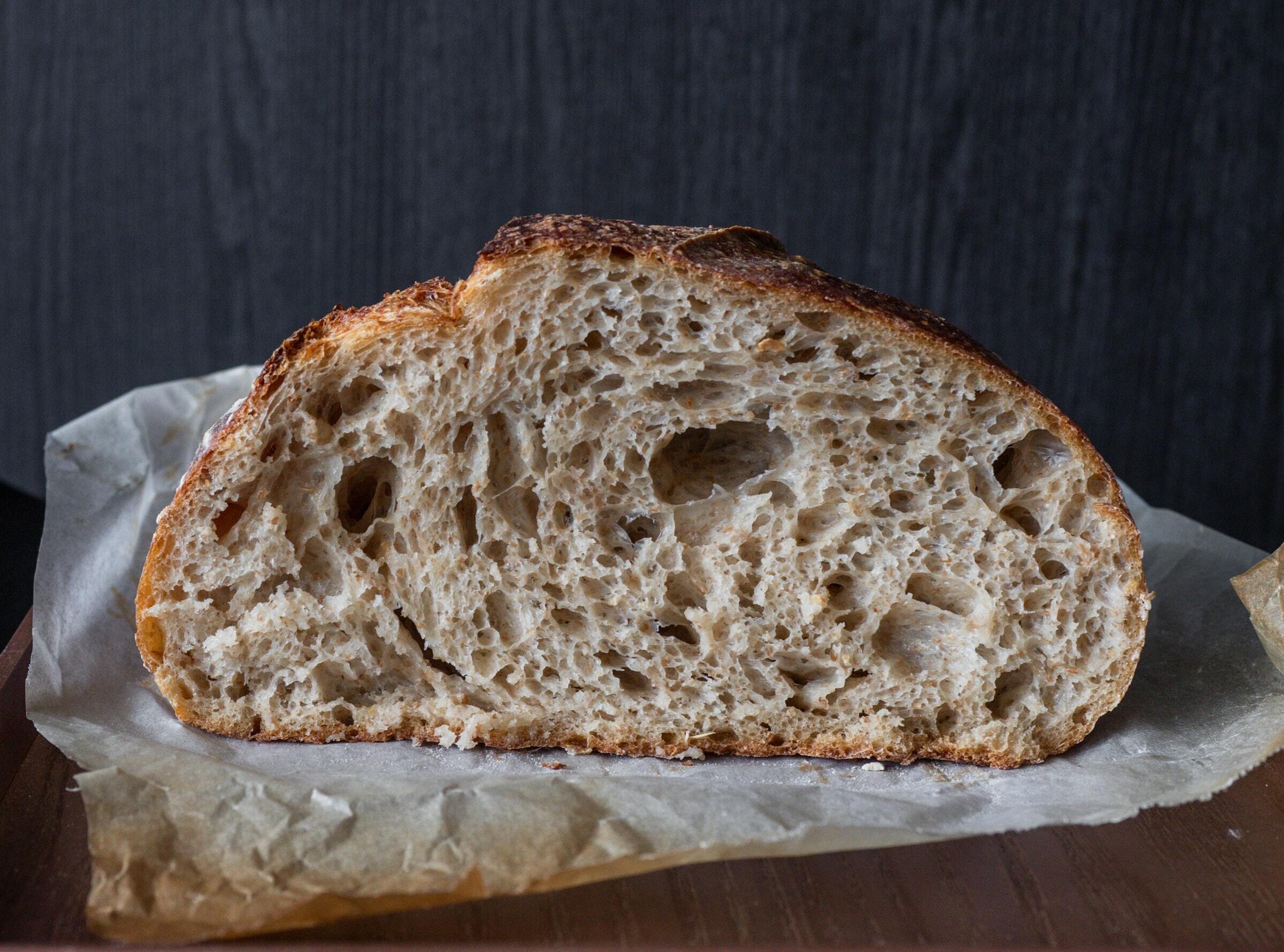 A loaf of bread cut in half exposing the center