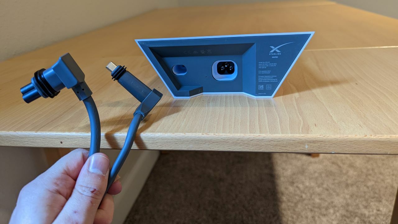 Starlink router, with power and data cable disconnected