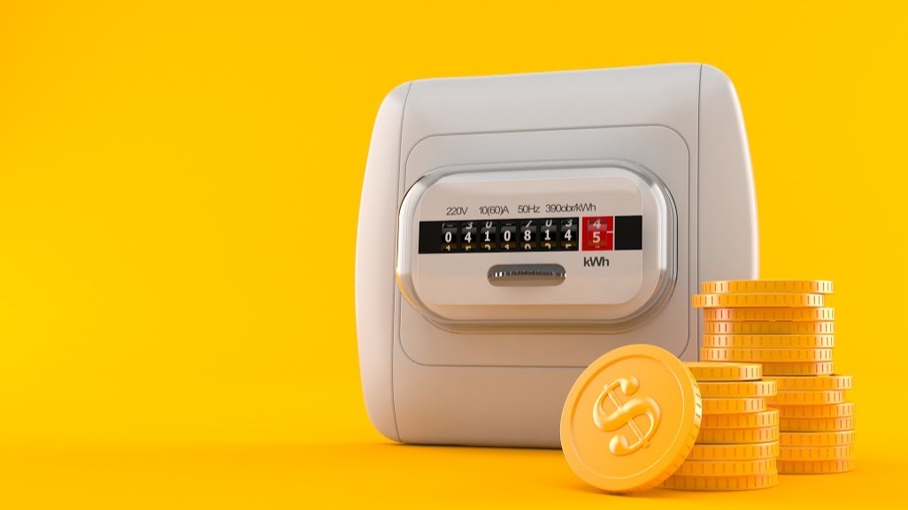 Electricity measure with stack of coins - stock photo