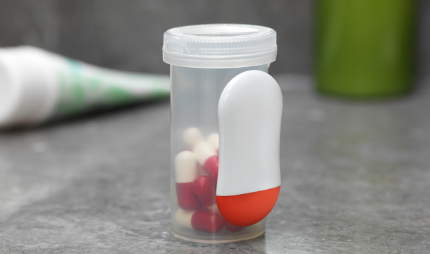 Sen.se Mother Motion Cookie on medication bottle