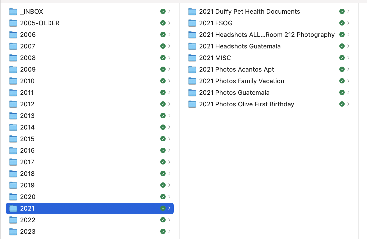 A computer folder structure showing a list of folders named for each year, such as 2020, 2021, etc., with subfolders such as 2021 Photos