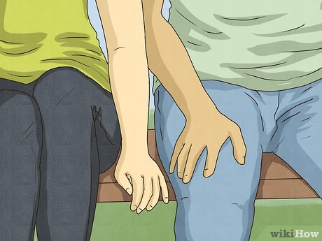 Image titled Tell if a Girl Wants to Hold Hands Step 1