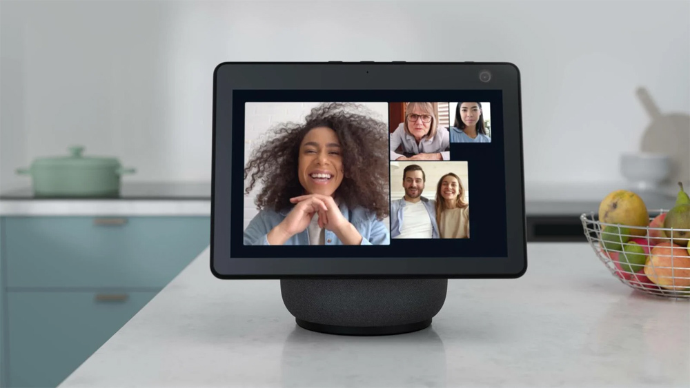 Amazon Echo Show 10 on kitchen counter with video call on screen