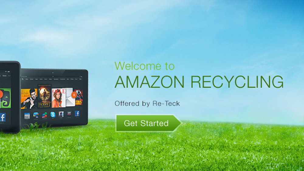 Amazon Fire tablet on a grassy hill with text that says Amazon Recycling