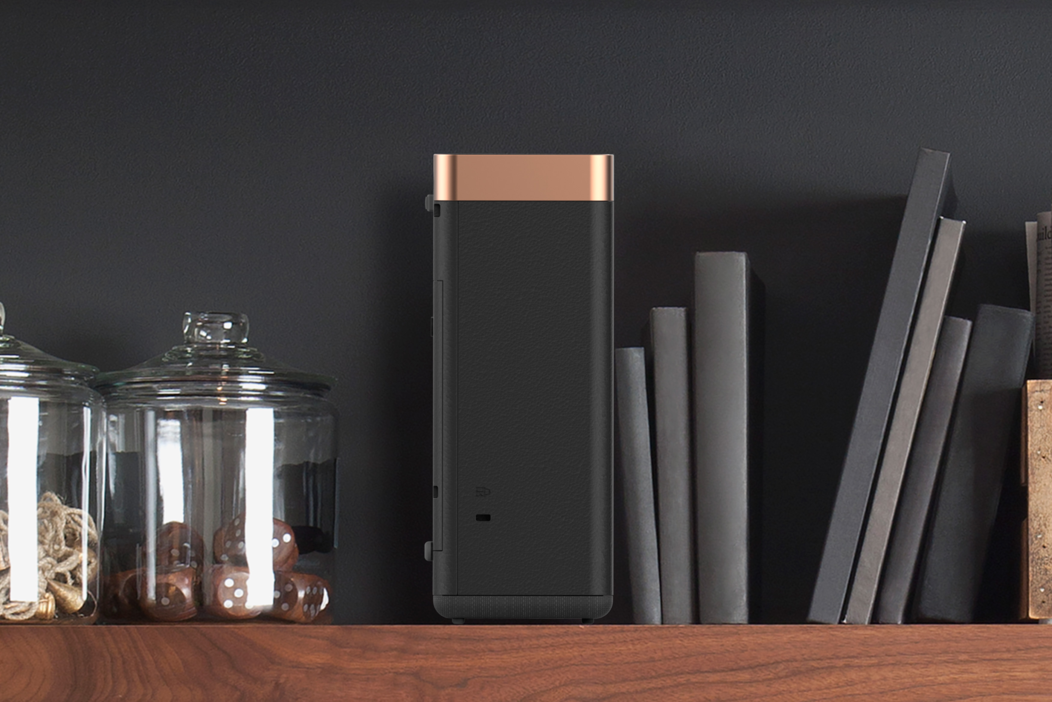 Epson EF-100 on bookshelf