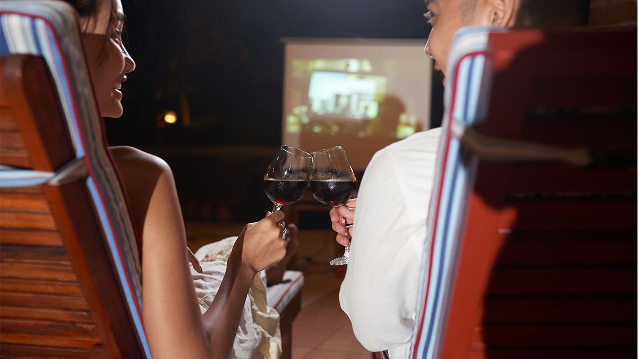 Couple with outdoor projector