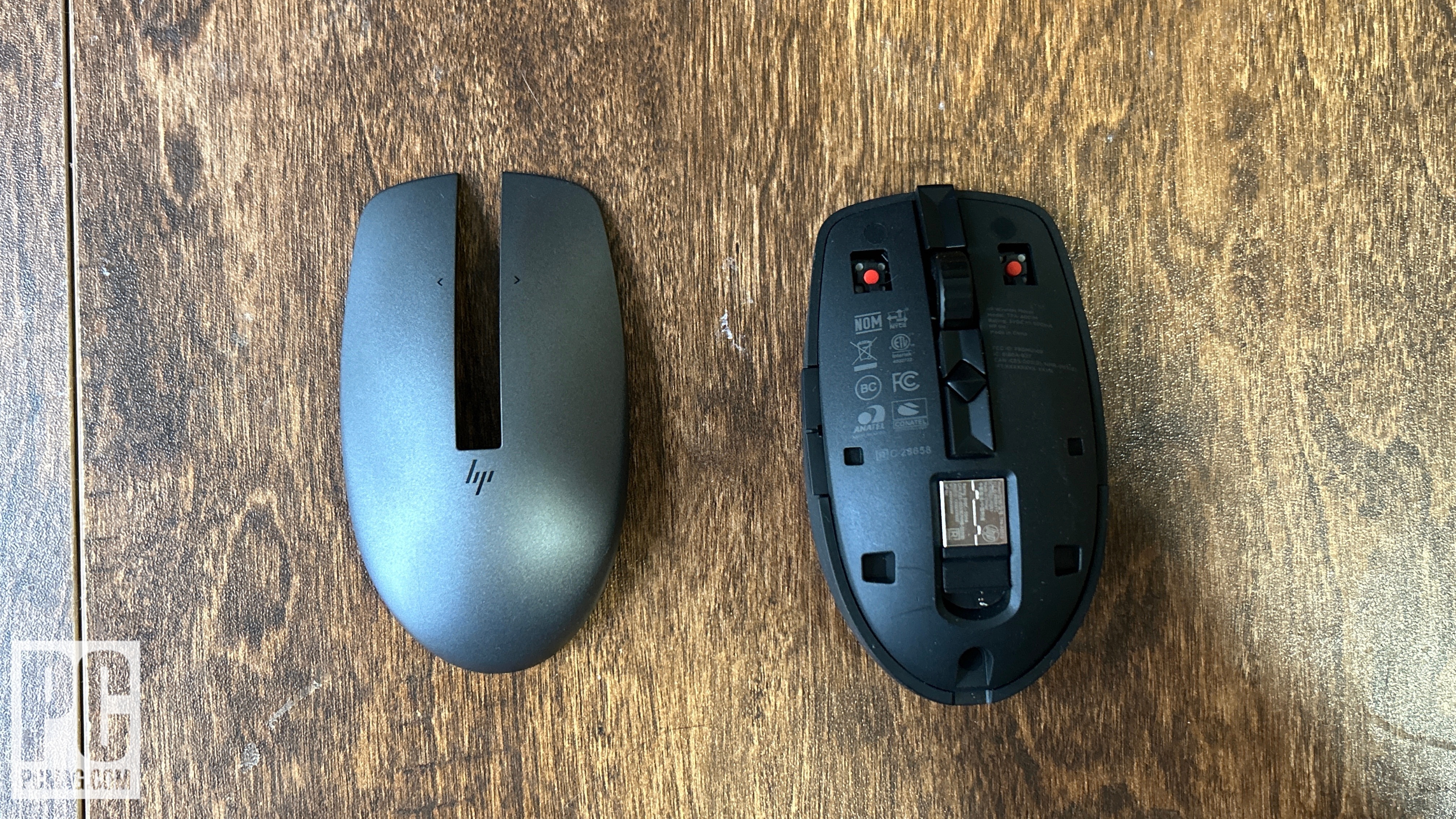 The HP 710 Rechargeable Silent Mouse with top cover removed