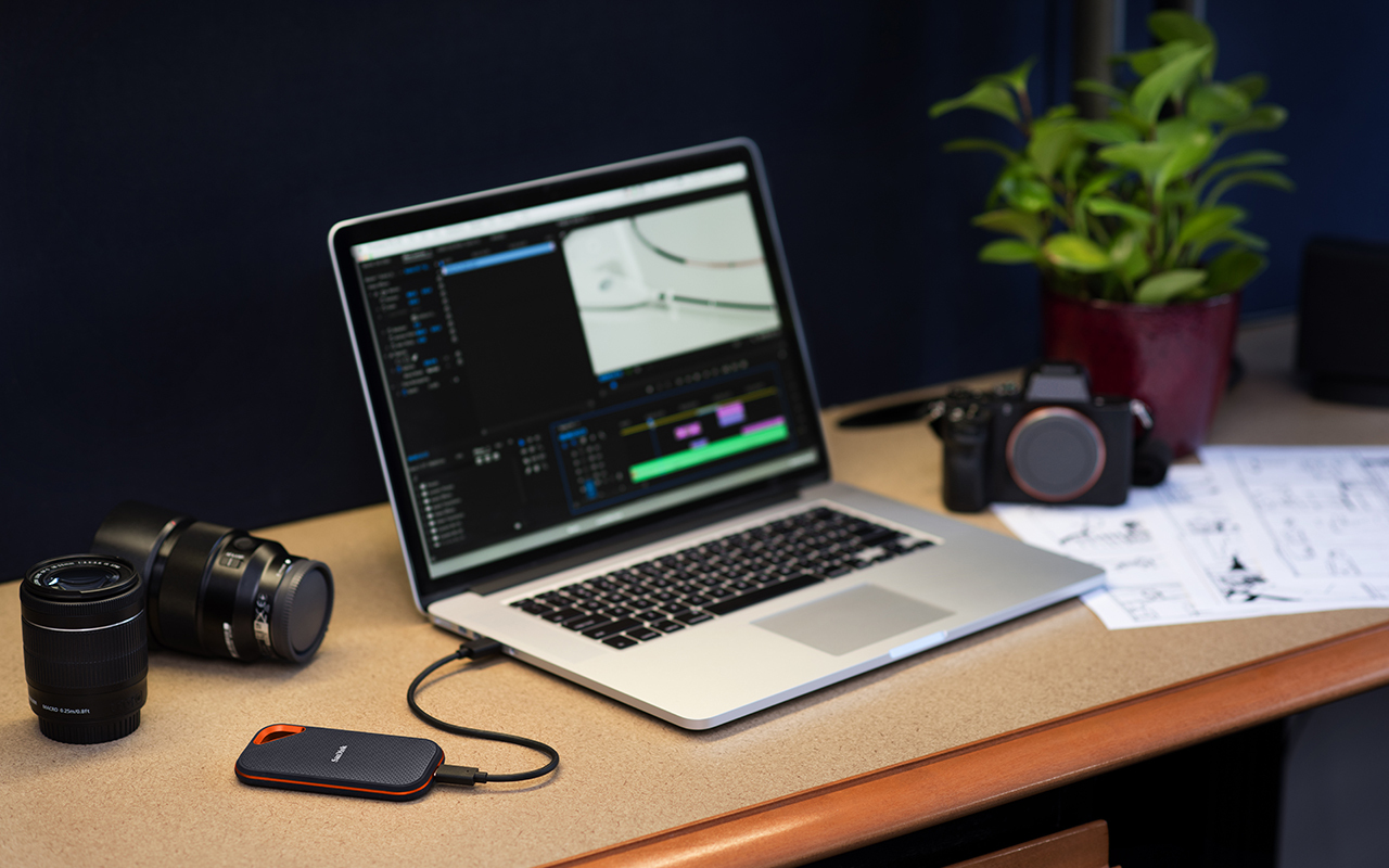 SanDisk Extreme Pro Portable SSD V2 with laptop