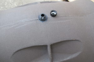 drain on two-batch tumbling composter