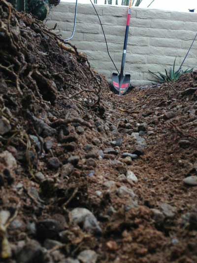 trenching with Earth Talon shovel