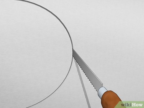 Step 4 Cut a hole in the wall to reach pipes at risk of burstng.