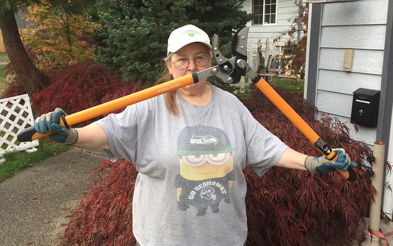 Fiskars Cut and Grip lopper holding the loppers fully opened