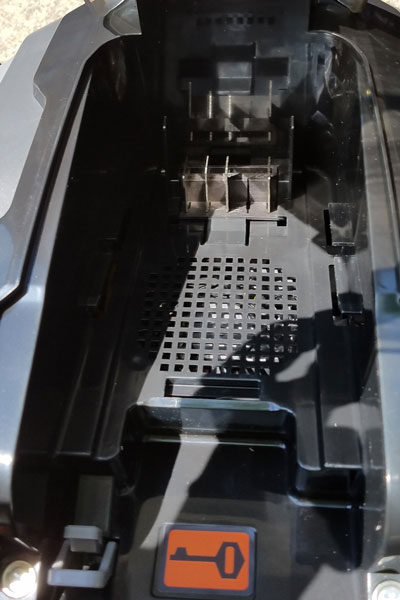 Redback mower battery compartment