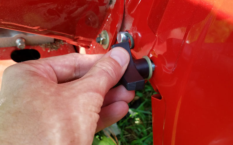 Troy-Bilt Chipper Shredder removing the discharge chute