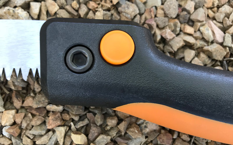 Fiskars-Folding-Hand-Saw-open-close-button