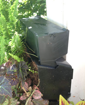 The GroVert Irrigator sits on top of the living wall
