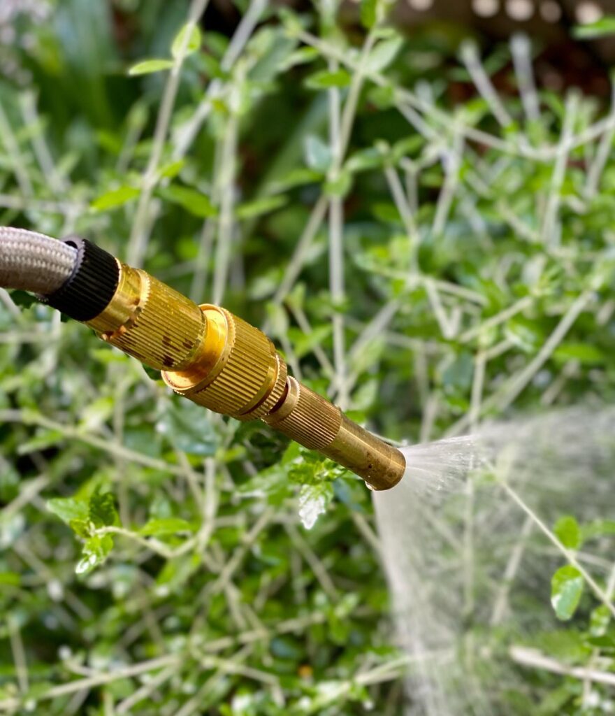 a solid brass hose nozzle spray