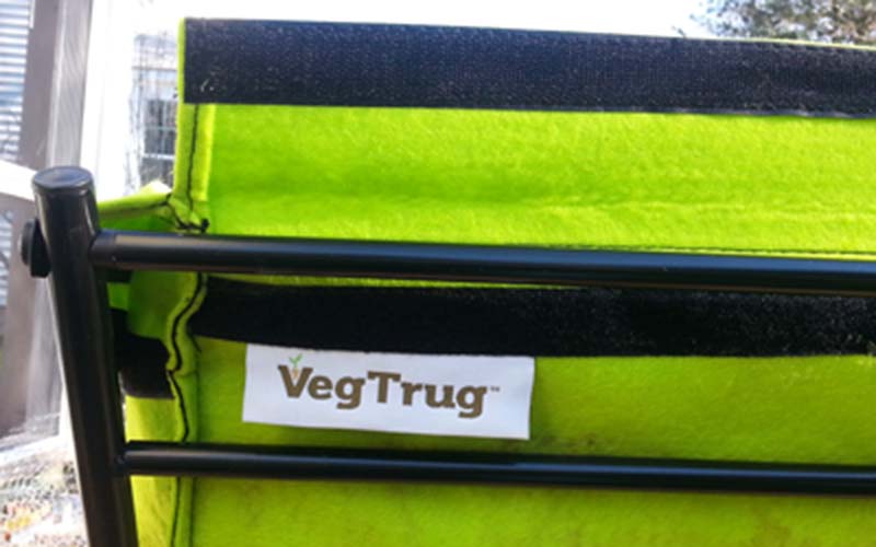 Velcro strips hold Poppy Planter liner in place